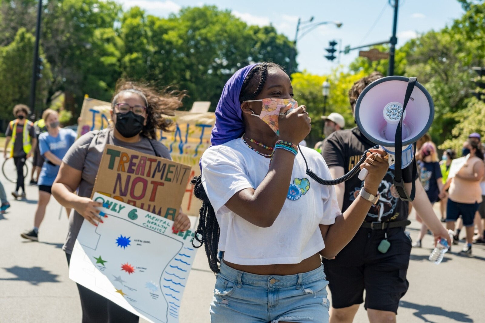 Person on bull horn marching