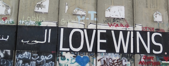 Love Wins on the separation wall near Bethlehem, photo by Lucy Duncan