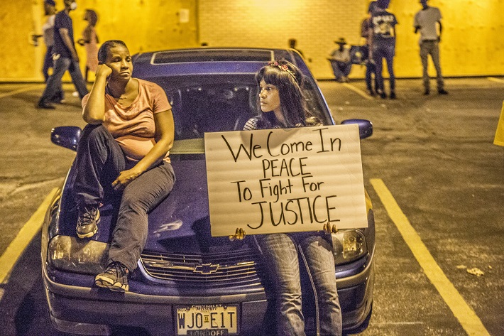 We come in peace to fight for justice by Justin Norman via Flickr CC license