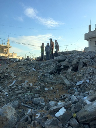 On top of a rubble pile in Gaza