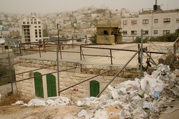 A military observation post on top of a Palestinian home in Hebron.