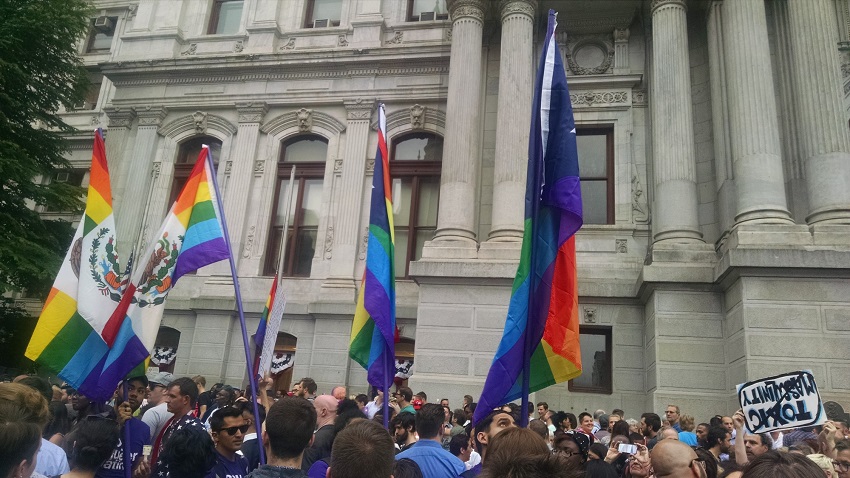 Rainbow flags at the "Philly Stands with Orlando" Rally in June 2016. Photo by Ralph Medley / AFSC.